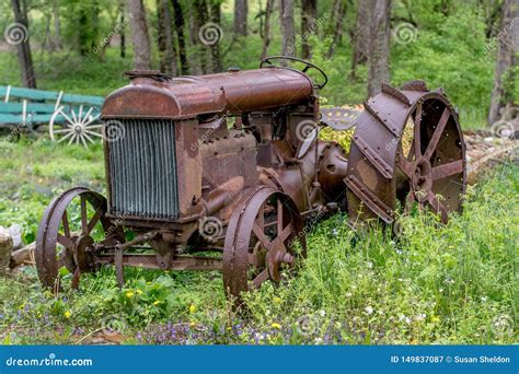 Old Metal Tractor Parked And Forgotten In A Field Stock Image Image