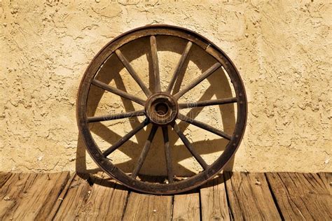 Wagon Wheel Of The Old West Stock Photo - Image of desert, american ...