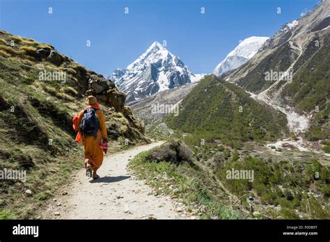 A Sadhu Holy Man Onhis Way Up To Gaumukh The Main Source Of The Holy