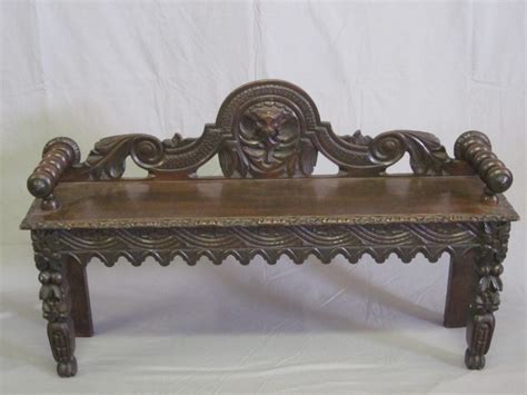 A Victorian Carved Oak Hall Bench With Raised Back Th July