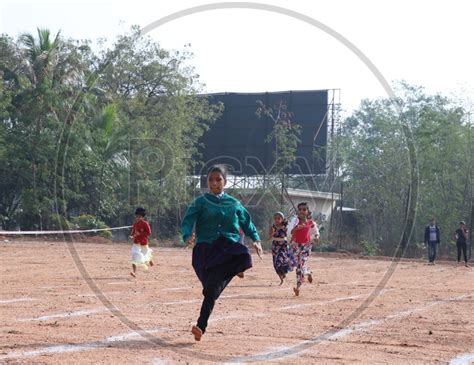 Image Of Boy Students Participating In A School Running Race