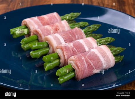 Bacon asparagus roll Stock Photo - Alamy