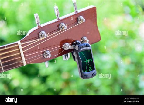 Tuning Guitar Hi Res Stock Photography And Images Alamy