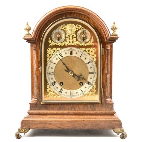 Lot 416 - Oak mantel clock,