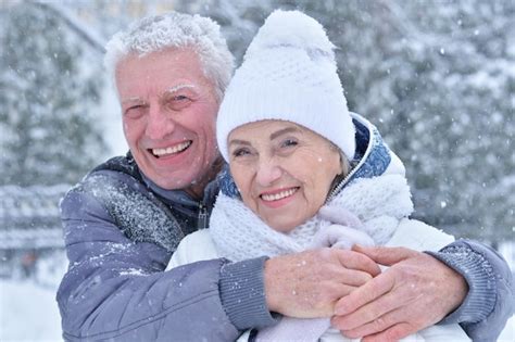 Premium Photo Happy Senior Couple Posing In Winter Outdoors