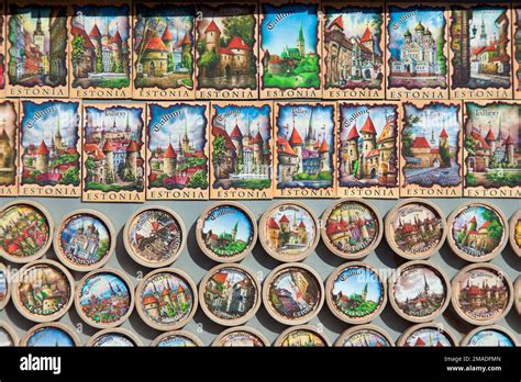 Estonia, Tallinn, tourist souvenirs, fridge magnets on market stall ...
