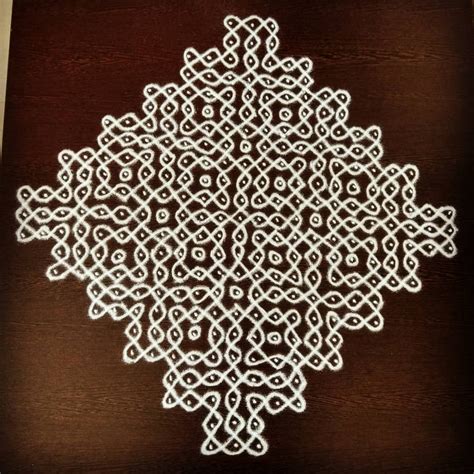 10 Beautiful Pulli Kolam Images For Stunning Wedding Decor