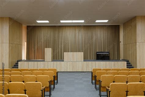 Assembly Hall At The School With Empty Chairs And Stage Hall For A Small Audience To Organize