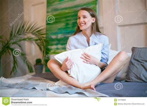 Beatiful Brunette Woman Stretching In Bed After Wake Up Stock Photo