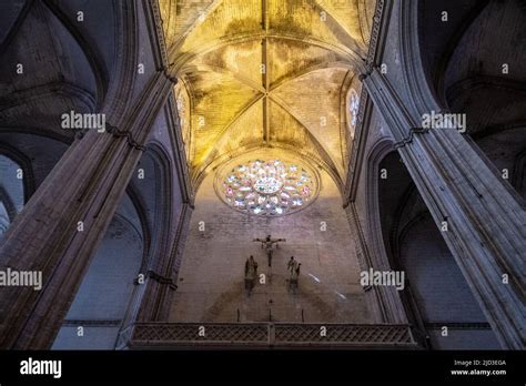 The ornate architecture of the Seville Cathedral interior, Seville ...