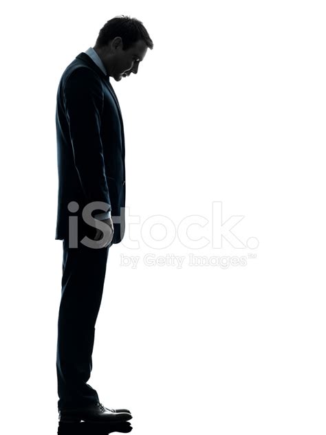 Sad Business Man Looking Down Silhouette Stock Photo | Royalty-Free ...