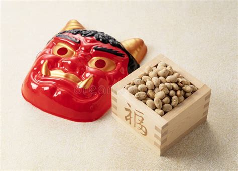 Beans For Bean Throwing And Masks Of Ogres Placed On A Japanese Style