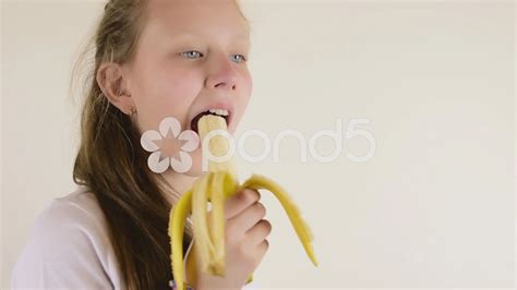 Girl Eating Banana