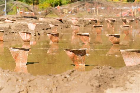 Mud Pit at a Mud Run Obstacle Course Stock Image - Image of muddy, outdoors: 34023451