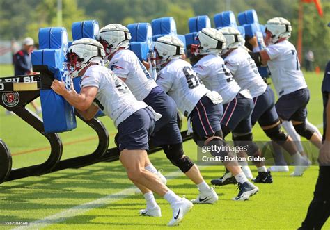 New England Patriots Linemen Push A Sled During The First Day Of The