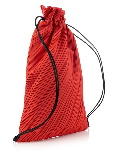 Lyst Pleats Please Issey Miyake Pleated Drawstring Backpack In Red