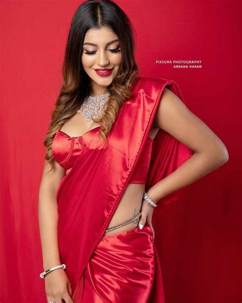 Iruttu Araiyil Murattu Kuththu Yashika Aannand Latest Hot Red Saree Images
