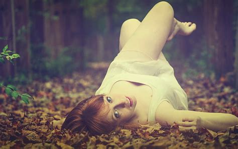 Womens White Tank Dress Woman In White Dress Laying On Dried Grass