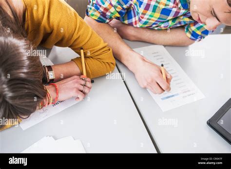 Students Working Together In Class Stock Photo Alamy