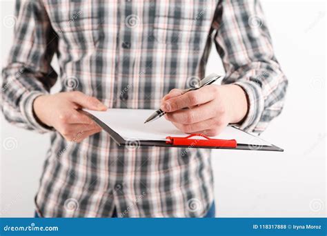 Business Man In Suit Holding A Blank Clipboard Stock Photo Image Of