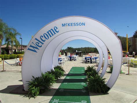 Spandex Arch Entrance Into Sports Themed Event With Football Field