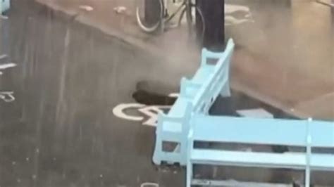 Watch Manhole Cover Gets Pelted In Mtl Storm