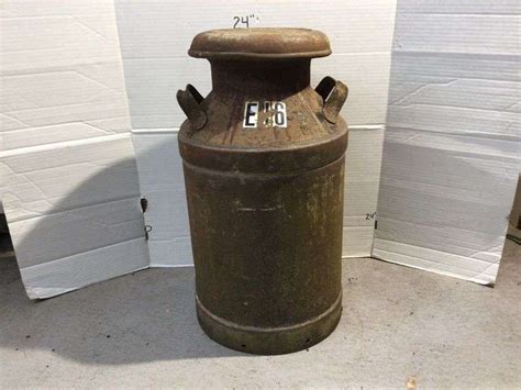 10 GALLON MILK CAN WITH LID Currie Auction Service