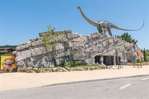 Main Entrance To Dino Parque Lourinha With A Life Size Dinosaur Model