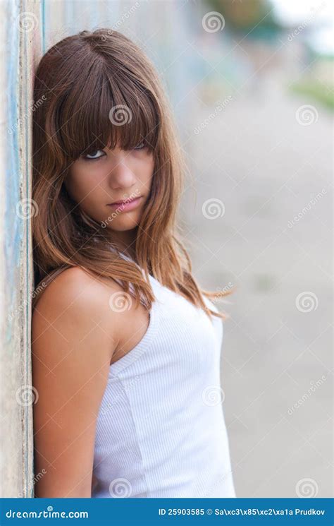 Beautiful Teenage Girl Leaning Against Wall Stock Image Image Of Hair