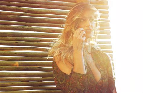 Theres Nothing Better Than Being You A Fashionable Young Woman Posing Against A Wooden