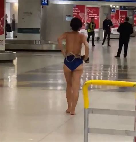 Naked Woman Wanders Miami Airport And Jumps On Police Car Travel Off Path