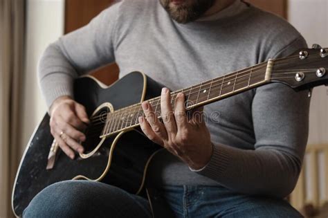 Playing The Guitar Strumming Acoustic Guitar Musician Plays Music