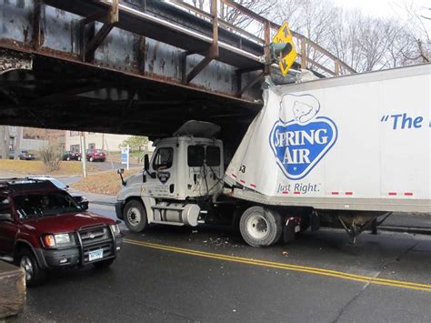 Tractor Trailer Crashes Into Bridge