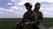 Dumb And Dumber Frozen On Bike Gif - pic-potatos