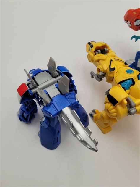 Transformers Rescue Bots Dino Bots Primal Optimus Chase Bumblebee