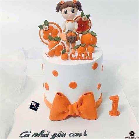 Bánh fondant thôi nôi dành cho em bé Cam đáng yêu Bánh Thiên Thần