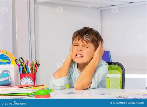 Screaming Boy With Autism Close Ears Using Hands Stock Image