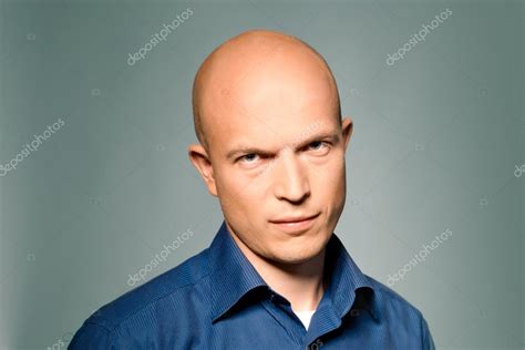 Handsome Bold Man Wearing Blue Skirt Stock Photo By ©evasilchenko 14072206