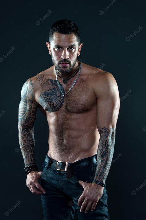 Premium Photo Tempting Glance Bearded Man With Tattooed Torso Macho Sexy Bare Torso Fit Model