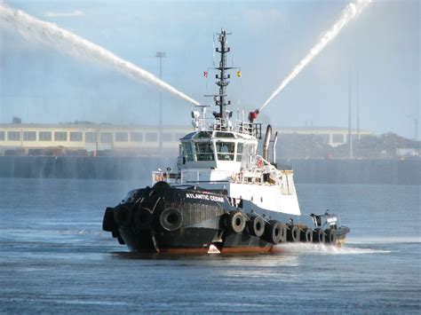 Spraying Tugboat C E Frees Melvin