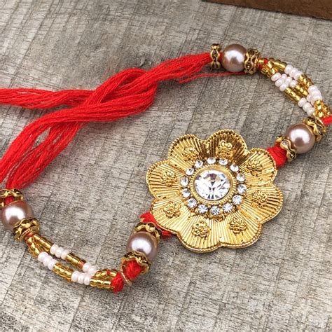 Golden Flower Precious Brother Rakhi For Raksha Bandhan Buy Online