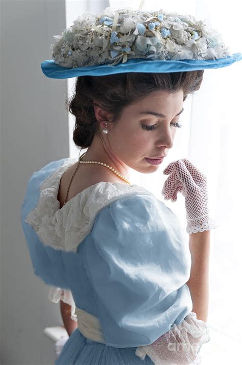 Beautiful Edwardian Woman In A Blue Dress With Peach Basket Hat