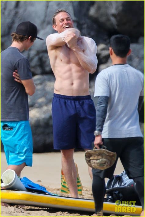 Shirtless Charlie Hunnam Puts On Sunscreen At The Beach In These Hot