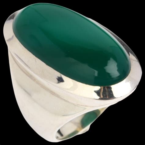 A Large Sterling Silver Green Chalcedony Dress Ring Rub Over Set With