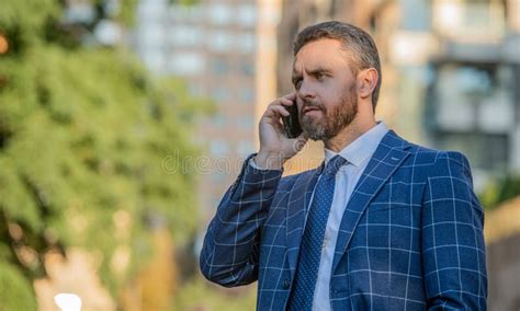 Businessman Call On Phone Outside Banner Photo Of Businessman Call On