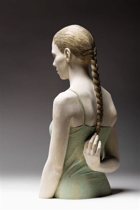 Lifelike Wood Sculptures of Pensive Men and Women