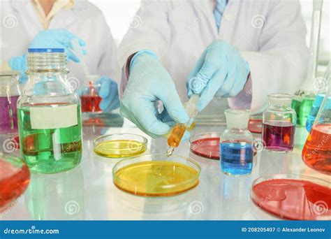 Scientists in the Laboratory Conduct Experiments. Stock Image - Image ...