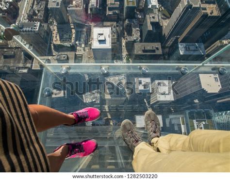 Tourists Posing On Glass Floor Skyscraper Stock Photo 1282503220