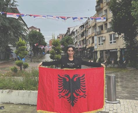 An Albanian Singer Displays The Albanian Flag In The North Everything