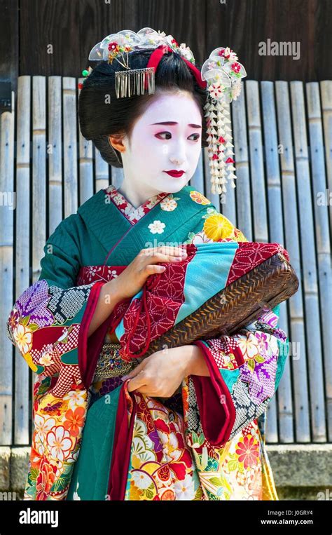 Young Beautiful Japanese Women Called Maiko Wear A Traditional Dress